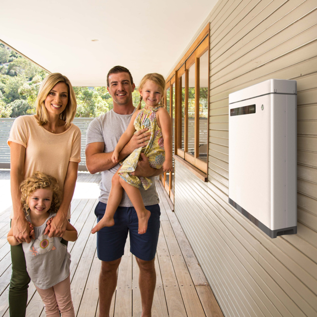 Family with two kids standing next to GoodWe